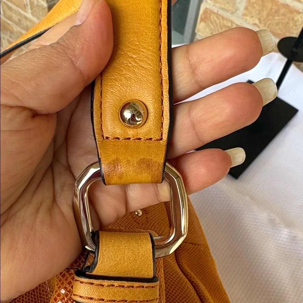B. Makowsky Orange Hobo Bag